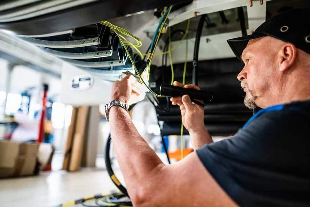 electrical engineer under a train